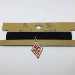Beaded choker necklace with protective symbols